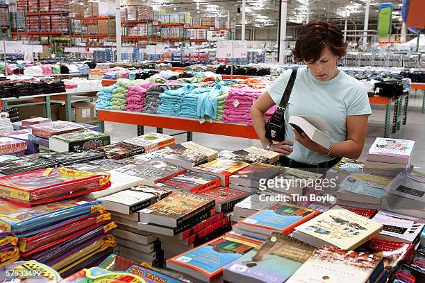 Leah Cannon looks at books as she shops at the Costco store May 4, 2006 in Mount Prospect, Illinois. Retail spending in April was reportedly the...