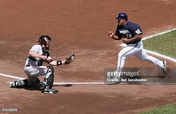Todd Greene of the San Francisco Giants collides with Prince Fielder of the Milwaukee Brewers in the first inning on May 4, 2006 at Miller Park in...