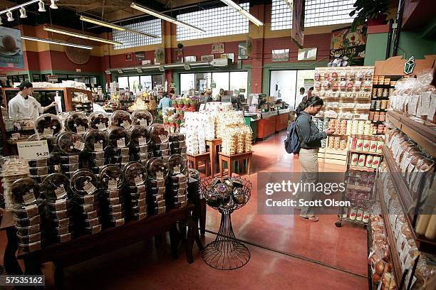 Customer is seen shopping at a Whole Foods store on May 4, 2006 in Chicago, Illinois. Texas-based natural and organic foods retailer Whole Foods...