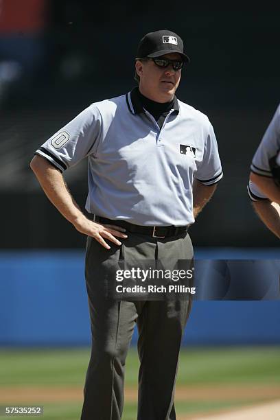 Umpire Paul Emmel looks on during the game between the Kansas City Royals and the New York Yankees at Yankee Stadium on April 13, 2006 in Bronx, New...