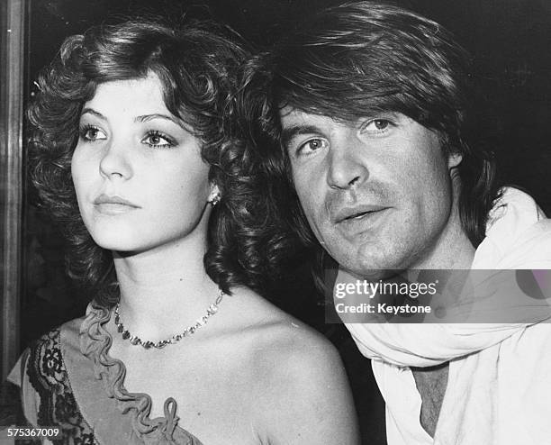 Actor Oliver Tobias and model Sasky arriving at the premiere of the film 'The Stud', London, April 12th 1978.