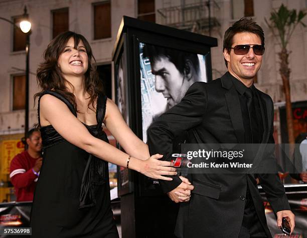 Actor Tom Cruise and actress Katie Holmes arrive at the Paramount Pictures fan screening of "Mission: Impossible III" held at the Grauman's Chinese...