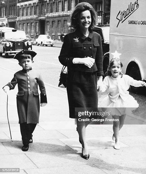 Princess Lee Radziwill, sister of Jacqueline Kennedy, with her children Anthony and Anna Christina arriving for the Children's Dancing Matinee at the...
