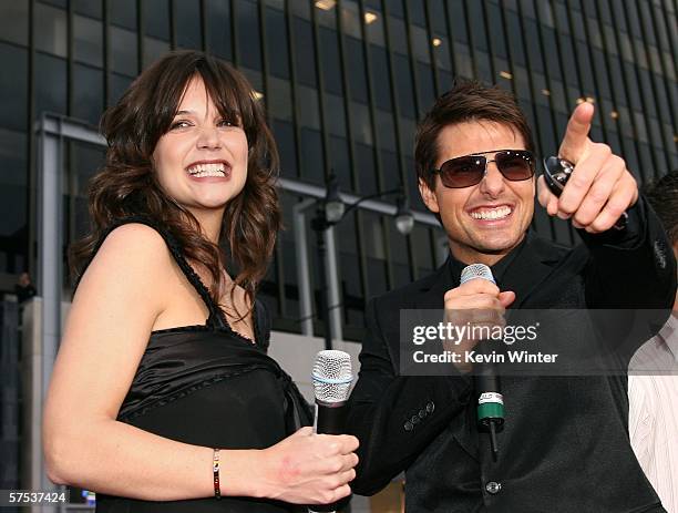 Actress Katie Holmes and actor Tom Cruise announce the Power 106 contest winners at the Paramount Pictures fan screening of "Mission: Impossible III"...