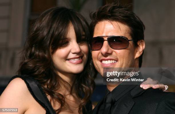 Actor Tom Cruise and actress Katie Holmes arrive at the Paramount Pictures fan screening of "Mission: Impossible III" held at the Grauman's Chinese...