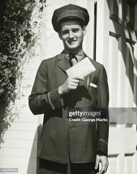 Postmen Uniform Postman Uniform Photos and Premium High Res Pictures - Getty Images
