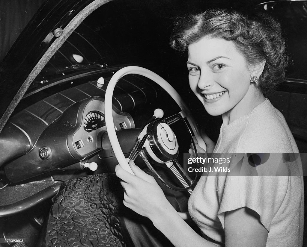 Portrait of actress Joan Rice at the wheel of the new Ford... News ...