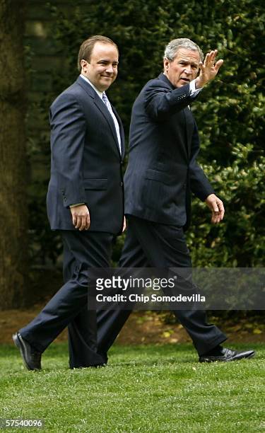 United States President George W. Bush and Press Secretary Scott McClellan walk to the West Wing May 5, 2006 in Washington, DC. Bush and McClellan...