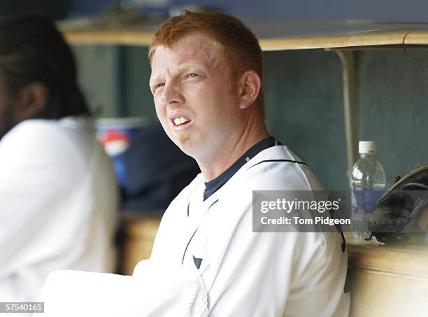 Chris Shelton of the Detroit Tigers sits in the dugout against the Chicago White Sox during the home opener at Comerica Park on April 10, 2006 in...