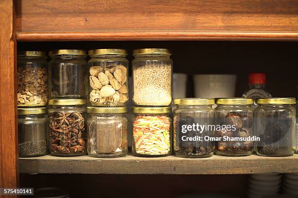 various spices in jars - george town penang stock pictures, royalty-free photos & images