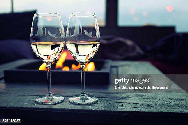 two glasses of white wine - chardonnay grape stock pictures, royalty-free photos & images