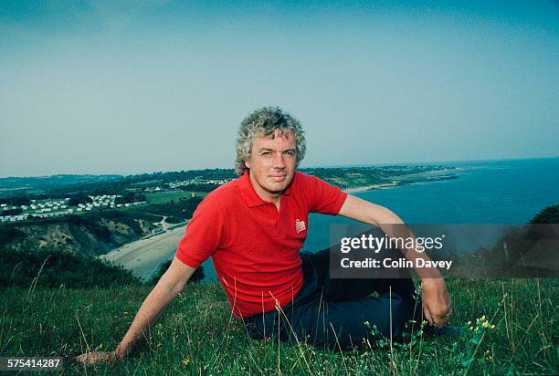 English writer and conspiracy theorist David Icke poses on the clifftop at Whitecliff Bay on the Isle of Wight, UK, 26th June 1992. Icke lives nearby...