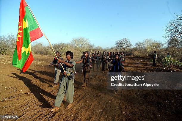 Full OLF platoon are on marching duty, the first soldier carries the national Oromo flag, February 14, 2006 in Kenya. Discipline is stric amongst OLF...