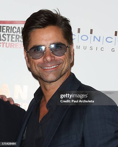 Actor John Stamos attends the premiere of "Norman Lear: Just Another Version Of You" at The WGA Theater on July 14, 2016 in Beverly Hills, California.
