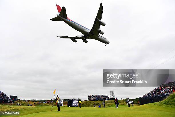 Plane flies over the 8th green during the second round on day two of the 145th Open Championship at Royal Troon on July 15, 2016 in Troon, Scotland.