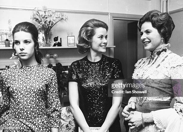 Princess Grace of Monaco , with her daughter Caroline , chatting to actress Ingrid Bergman after her performance in the play 'Captain Brassbound's...