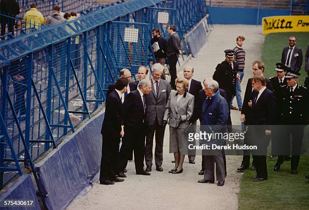 Prime Minister of the United Kingdom, Margaret Thatcher , visiting Hillsborough Stadium in Sheffield, the day after the stampede which resulted in...