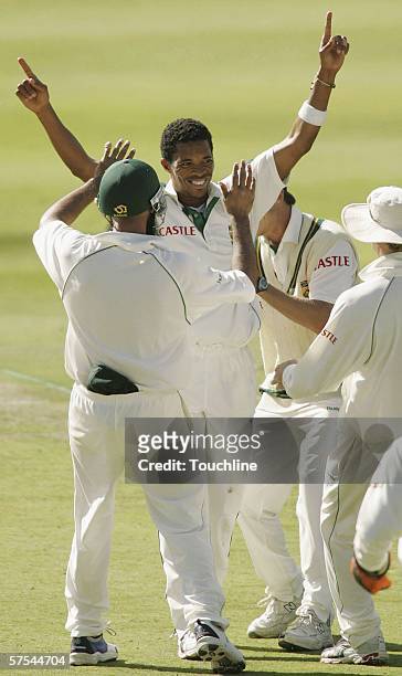 Makhaya Ntini of South Africa celebrates his fifth wicket during day one of the third and final test match between South Africa and New Zealand at...