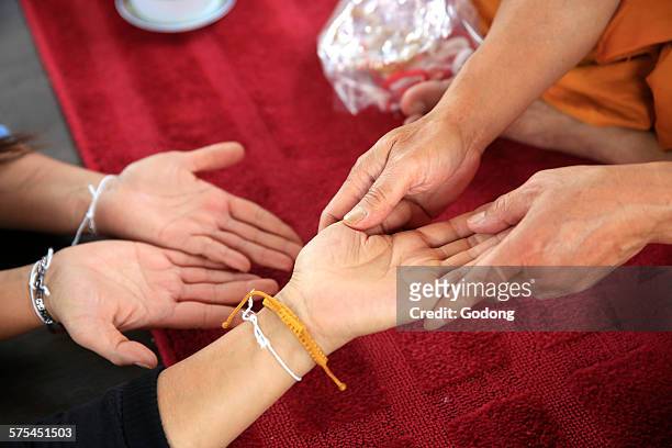 buddhism - palmistry hand stock-fotos und bilder