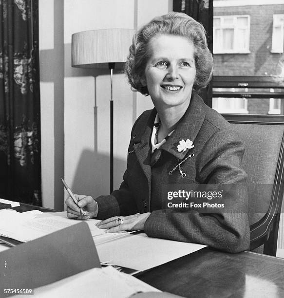 Politician Margaret Thatcher, the newly appointed Secretary of State for Education and Science, pictured working at her desk in her new office at the...