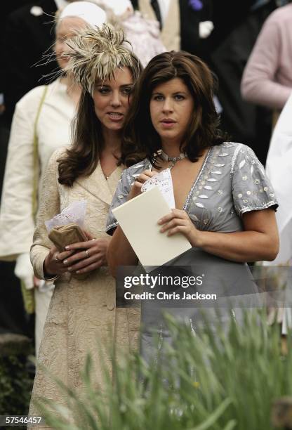 Girlfriend of Prince William, Kate Middleton and a guest leave Laura Parker Bowles wedding to Harry Lopes at St Cyriac's Church, Lacock on May 6,...