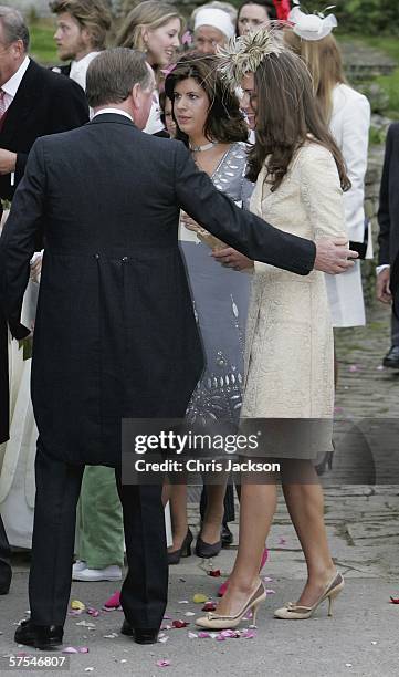 Girlfriend of Prince William Kate Middleton is led by Andrew Parker Bowles as they leave Laura Parker Bowles wedding to Harry Lopes at St Cyriac's...