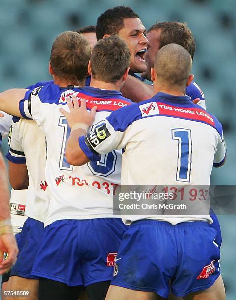 Willie Mason of the Bulldogs celebrates with team mates after scoring a try during the round nine NRL match between the Roosters and the Bulldogs...