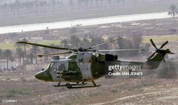 This file photo shows a British Mark 7 Lynx helicopter in flight south of Al Qurnah, Iraq, 09 April 2003. The British military in Iraq 07 May 2006...