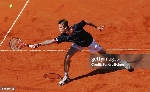 Kristof Vliegen of Belgium in action against Olivier Rochus of Belgium during the final of the BMW Open at the Iphitos tennis club on May 7, 2006 in...