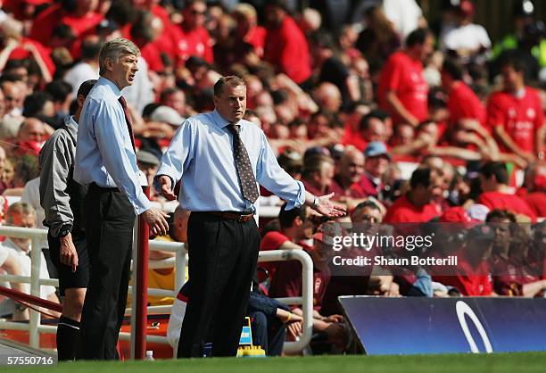 Arsene Wenger the Arsenal manager and Paul Jewell the Wigan Athletic manager come to the touchline during the Barclays Premiership match between...