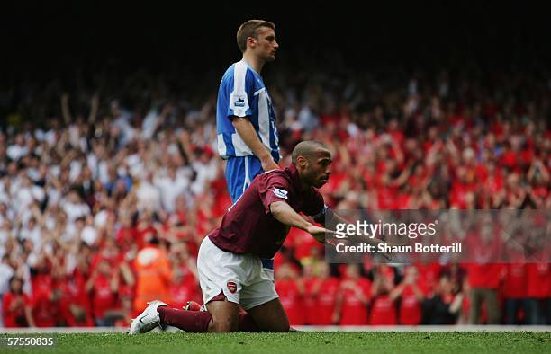 Thierry Henry of Arsenal celebrates scoring his teams fourth goal by bowing to the North Bank fans during the Barclays Premiership match between...