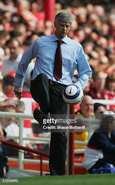 Arsene Wenger, the Arsenal manager, kick the match ball during the Barclays Premiership match between Arsenal and Wigan Athletic at Highbury on May...