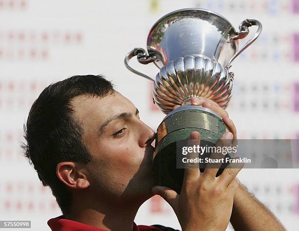 Francesco Molinari of Italy poses with the trophy after winning The Telecom Italian Open Golf at The Castello Di Tolcinasco Golf Club on May 7 2006...