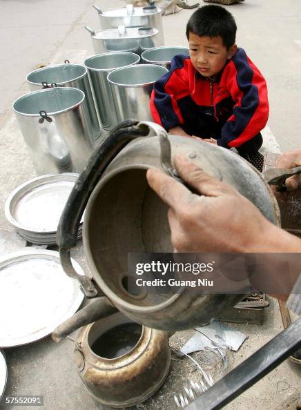 Chinese Farmer Labors At A Market On The Outskirt Of Baoding City