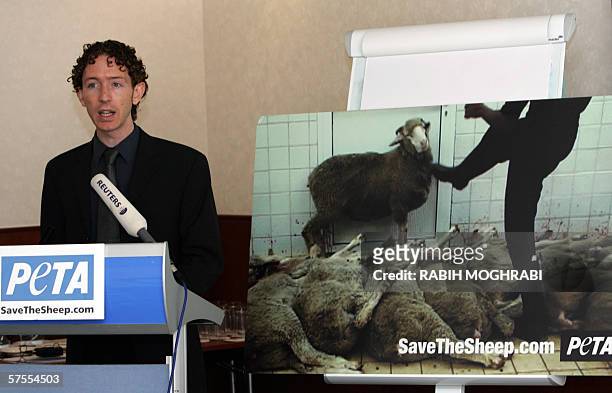 Dubai, UNITED ARAB EMIRATES: Andrew Butler, Africa Region representative of the radical animal rights group PETA, announces the launch for the first...
