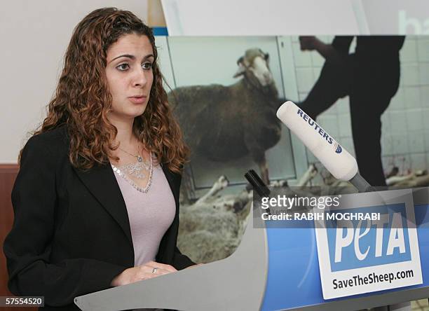 Dubai, UNITED ARAB EMIRATES: Egyptian Nadia Montasser, activist of the radical animal rights group PETA, speaks to reporters in Dubai, as the group...