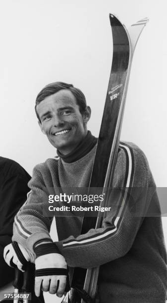 French alpine skier Jean-Claude Killy as leans on his poles and smiles, 1960s.