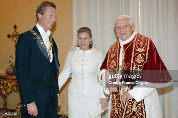 Pope Benedict XVI meets Grand Duke Henri of Luxemburg and Grand Duchess Maria-Teresa of Luxemburg at his private library, May 8 in Vatican City.
