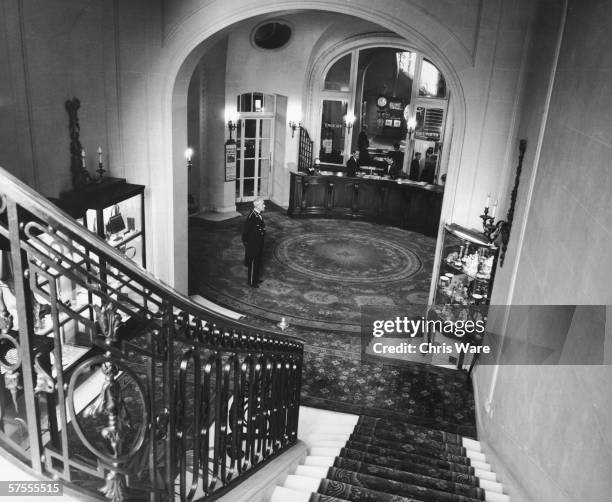 The Grand Staircase of the Ritz Hotel in London, looking down toward the reception desk, 29th May 1963.