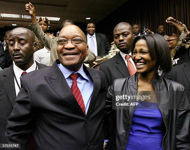 Johannesburg, SOUTH AFRICA: South Africa's former deputy president Jacob Zuma embraces his daughter Duduzile Zuma after being acquitted of rape at...