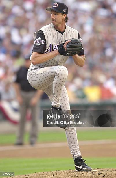 Randy Johnson of the Arizona Diamondbacks pitches for the National League during the 2001 Major League Baseball All-Star game at Safeco Field in...