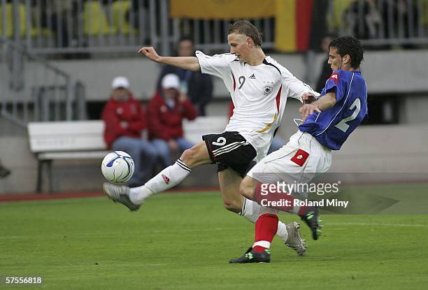 Fischer Manuel of Germany evades Brkovic Dusan of Serbia Montenegro to score the second goal, during the Men's Under 17 European Championship match...