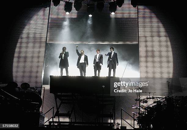 Howard Donald, Gary Barlow, Mark Owen and Jason Orange of Take That perform on stage as part of their 'Ultimate Tour 2006' at Wembley Arena on May 8,...