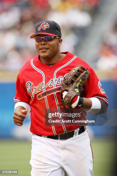 Andruw Jones of the Atlanta Braves runs in from the outfield against the New York Mets at Turner Field on April 30, 2006 in Atlanta, Georgia. The...