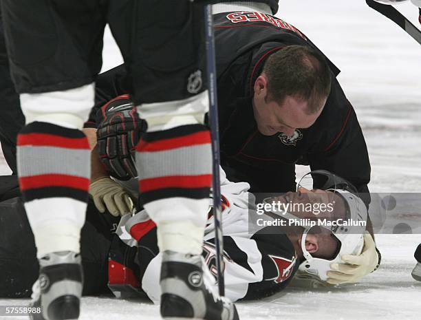 Tim Connolly of the Buffalo Sabres lies on the ice during game two of the Eastern Conference Semifinals of the 2006 NHL Stanley Cup Playoffs against...