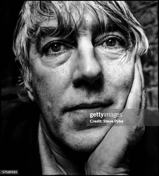 British comedian, actor and writer, Peter Cook at his home in Hampstead, London, February 1987. )