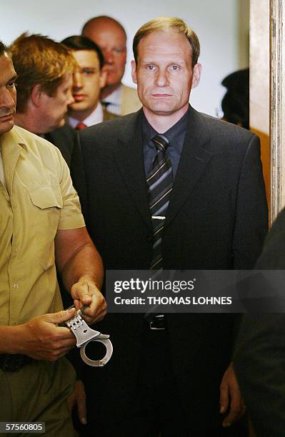 Self-confessed German cannibal Armin Meiwes arrives for a session of his re-trial 09 May 2006 in Frankfurt/M. The District Court of Frankfurt...