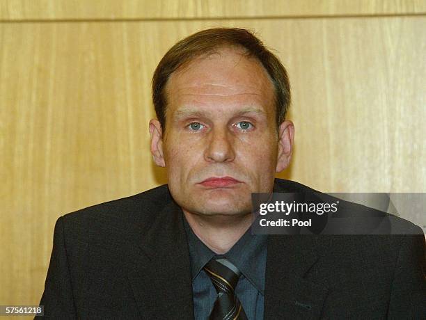Self-confessed cannibal Armin Meiwes awaits the verdict in his retrial for murder, on 09 May 2006 at court in Frankfurt, Germany. In the case that...