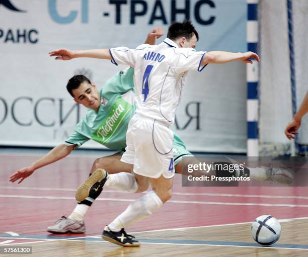 Alexander Rakhimov of Dinamo Moscow competes against Neto of Boomerang Interviu FS during UEFA Futsal Cup final on May 7, 2006 in Moscow, Russia.