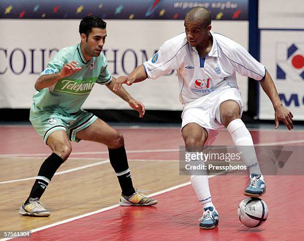 Sirilo of Dinamo Moscow competes against Neto of Boomerang Interviu FS during UEFA Futsal Cup final on May 7, 2006 in Moscow, Russia.
